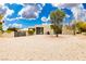 Modern home exterior with clean lines and desert landscaping at 4135 N Durango Dr, Las Vegas, NV 89129