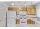 Clean kitchen featuring wood cabinets and gas range at 4555 E Sahara Ave # 280, Las Vegas, NV 89104