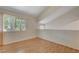 Light-filled bedroom featuring wood floors and window at 4770 Topaz St # 77, Las Vegas, NV 89121