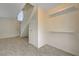 Bright entryway with tiled floor and staircase at 4770 Topaz St # 77, Las Vegas, NV 89121