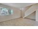 Living area with tile floor and front door view at 4770 Topaz St # 77, Las Vegas, NV 89121