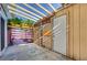 Cozy patio with pergola, wooden fence, and mural at 4770 Topaz St # 77, Las Vegas, NV 89121