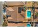 Aerial view of house, pool, and surrounding landscape at 4880 Da Vinci Way, Pahrump, NV 89061