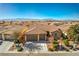 Single-story home with a two-car garage and mountain views at 4880 Da Vinci Way, Pahrump, NV 89061