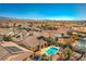 Community overview showcasing numerous homes and desert landscape at 4880 Da Vinci Way, Pahrump, NV 89061