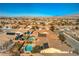 Aerial view of homes with solar panels, pools, and landscaped yards at 4880 Da Vinci Way, Pahrump, NV 89061