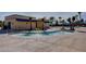 Small community pool and spa with a building nearby at 4880 Da Vinci Way, Pahrump, NV 89061