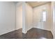 Bright entryway with wood-look flooring and access to interior rooms at 4880 Da Vinci Way, Pahrump, NV 89061