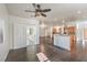 Bright living room with hardwood floors and sliding door to patio at 4880 Da Vinci Way, Pahrump, NV 89061