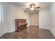 Bright music room featuring hardwood floors and a vintage piano at 4880 Da Vinci Way, Pahrump, NV 89061