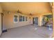 Covered patio with ceiling fans and sliding glass door access at 4880 Da Vinci Way, Pahrump, NV 89061