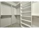 Large walk-in closet with shelving and hanging rods at 4880 Da Vinci Way, Pahrump, NV 89061