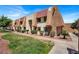A well-maintained apartment building with manicured landscaping and charming architectural details at 5493 Indian River Dr # 383, Las Vegas, NV 89103