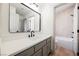 Stylish bathroom with a white quartz vanity and modern fixtures at 5904 Negril Ave, Las Vegas, NV 89130