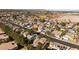 Aerial view of suburban neighborhood with houses and tree-lined streets at 6413 Peppermill Dr, Las Vegas, NV 89146