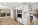 Modern kitchen with stainless steel appliances and white cabinets at 6413 Peppermill Dr, Las Vegas, NV 89146