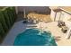 Pool with patio and lush landscaping at 6413 Peppermill Dr, Las Vegas, NV 89146