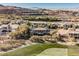 Luxury home nestled in a golf course community with mountain views at 646 Saint Croix St, Henderson, NV 89012