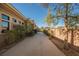 Long concrete patio pathway, offering a serene outdoor space at 646 Saint Croix St, Henderson, NV 89012