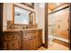 Bathroom with granite vanity and tiled shower at 646 Saint Croix St, Henderson, NV 89012