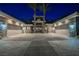 Contemporary home featuring an expansive driveway, porte-cochere, and three-car garage at 646 Saint Croix St, Henderson, NV 89012