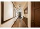 Long hallway with wood flooring and built-in cabinets at 646 Saint Croix St, Henderson, NV 89012