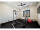 Home gym with treadmill, weights, and exercise equipment at 646 Saint Croix St, Henderson, NV 89012