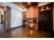 Warm and inviting library with a fireplace and custom built-ins at 646 Saint Croix St, Henderson, NV 89012