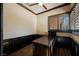 Home office with built-in desk and large window at 646 Saint Croix St, Henderson, NV 89012