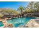 Resort-style pool with waterfall, slide, and spa at 646 Saint Croix St, Henderson, NV 89012