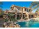 Luxury home with large pool, spa, and outdoor kitchen at 646 Saint Croix St, Henderson, NV 89012