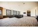 Upper floor landing overlooking the main level, featuring large windows and a stairway at 646 Saint Croix St, Henderson, NV 89012