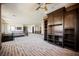 Upper floor sitting area with built-in entertainment center and media shelving at 646 Saint Croix St, Henderson, NV 89012