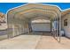 Spacious covered carport leading to garage offering ample parking and protection from the elements at 648 Mount Blackburn Ln, Boulder City, NV 89005