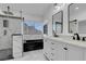 Beautiful bathroom featuring glass enclosed shower, tub, and double marble vanity at 6586 W Mesa Vista Ave, Las Vegas, NV 89118