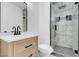 Modern bathroom with stylish vanity, shower stall, and contemporary finishes at 6586 W Mesa Vista Ave, Las Vegas, NV 89118