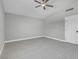 Bright bedroom with light wood floors and a ceiling fan at 6586 W Mesa Vista Ave, Las Vegas, NV 89118