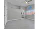 Spacious bedroom with light wood floors and a view to a modernized bathroom at 6586 W Mesa Vista Ave, Las Vegas, NV 89118