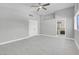 Bedroom featuring a double closet, light wood floors, and a bathroom en suite at 6586 W Mesa Vista Ave, Las Vegas, NV 89118
