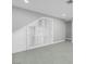 A bonus room under the stairs features built in shelving for storage at 6586 W Mesa Vista Ave, Las Vegas, NV 89118