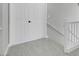 Upstairs hallway with views of the staircase and a closet space at 6586 W Mesa Vista Ave, Las Vegas, NV 89118