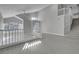 Spacious living area with staircase, vaulted ceiling, and ample natural light at 6586 W Mesa Vista Ave, Las Vegas, NV 89118