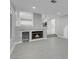 Bright living room featuring a fireplace, views into the kitchen, and recessed lighting at 6586 W Mesa Vista Ave, Las Vegas, NV 89118
