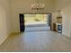 Elegant dining room with stunning chandelier and access to the backyard at 7405 Chorleywood Way, Las Vegas, NV 89131