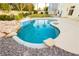 Relaxing kidney-shaped pool with rock landscaping at 7620 Pleasant Colony Ct, Las Vegas, NV 89131