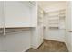 Large walk-in closet featuring shelves and hanging space at 7620 Pleasant Colony Ct, Las Vegas, NV 89131