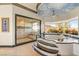 This bathroom showcases a soaking tub with mountain views next to the glass-enclosed shower at 942 Villa Grande Way, Boulder City, NV 89005
