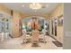 Dining area with tile floors, a marble fireplace, and comfortable seating for four at 942 Villa Grande Way, Boulder City, NV 89005