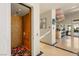 Elegant foyer featuring a private elevator, marble floors, and a modern chandelier at 942 Villa Grande Way, Boulder City, NV 89005