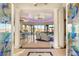 Elegant home foyer boasts marble floors, decorative columns, and an open view of the living space at 942 Villa Grande Way, Boulder City, NV 89005